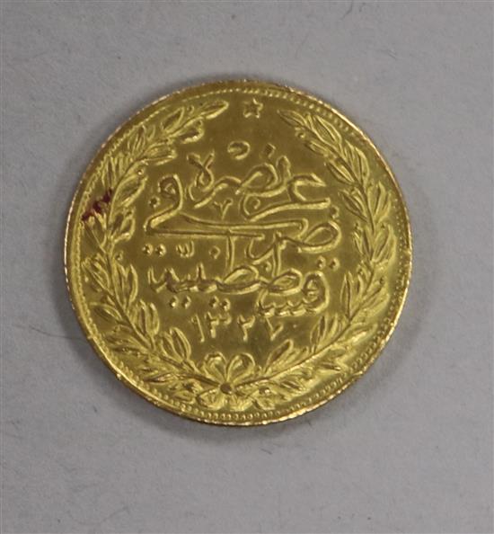 A Turkish 100 Kurush gold coin, 1912, 7.2g